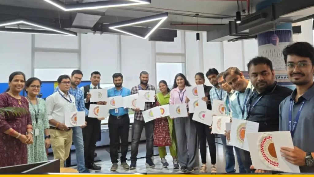 Photograph of some volunteers, standing and showing their tactile creation