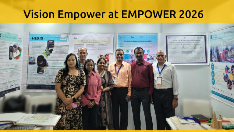 Vision Empower team at EMPOWER 2026, IIT Delhi, standing in front of displays featuring accessible learning resources, Hexis and the Accessible Resource Centre.