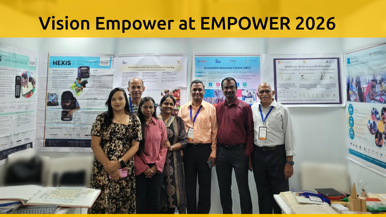 Vision Empower team at EMPOWER 2026, IIT Delhi, standing in front of displays featuring accessible learning resources, Hexis and the Accessible Resource Centre.
