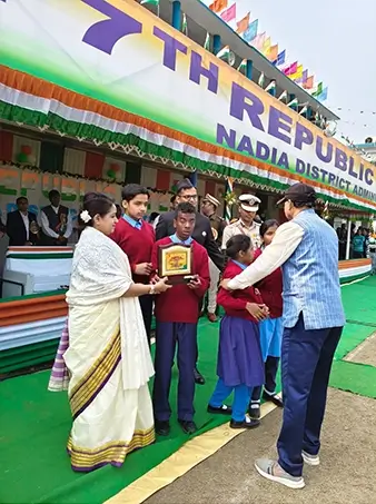 Students are being recognised or felicitated during a formal school event.
The presence of guests and teachers indicates an organised celebration or award ceremony.
The image highlights encouragement and appreciation of student participation.
