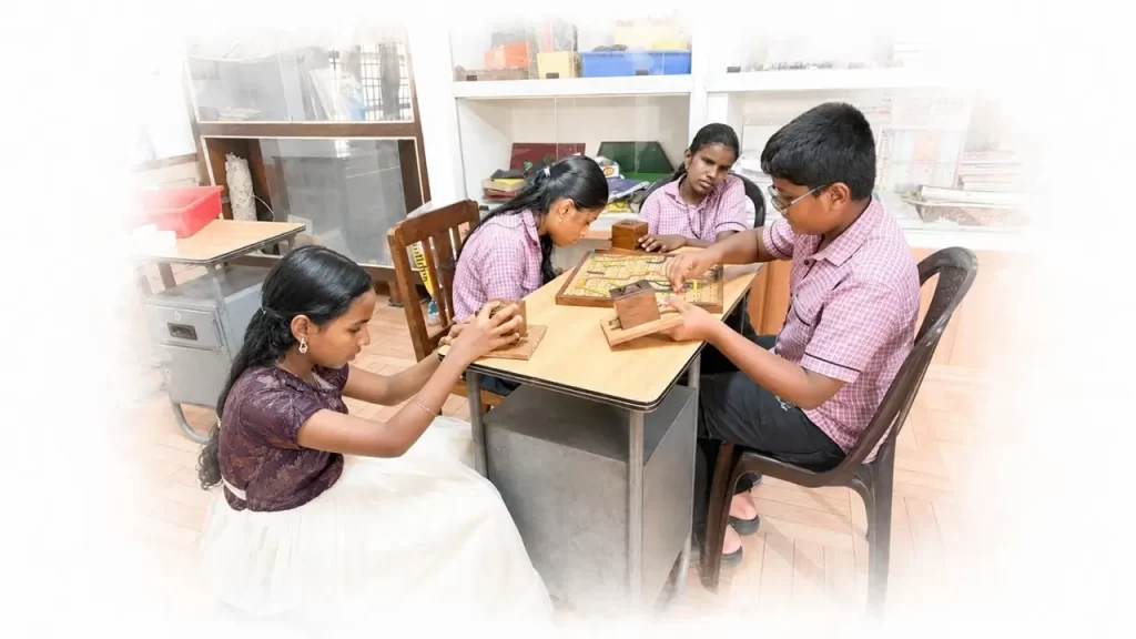 Children  playing Snakes and Ladders