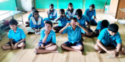 This image is of students from Municipality Blind School, Kendrapara, Odisha who are seated for the Children’s Day Celebrations, chocolats can be seen on their hands, courtesy VE