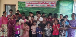 This image is of students & teachers from Louis Adarsha Blind school, Warangal, Telangana, where all are standing for a picture after celebrating Children’s Day with VE