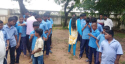 This image is of the students of St Amalarakhini Hr Sec School for Visually Impaired, Tiruvannamalai, TN, where VE’s RP is seen distributing chocolates, courtesy VE to the kids who are standing in 2 straight lines heightwise
