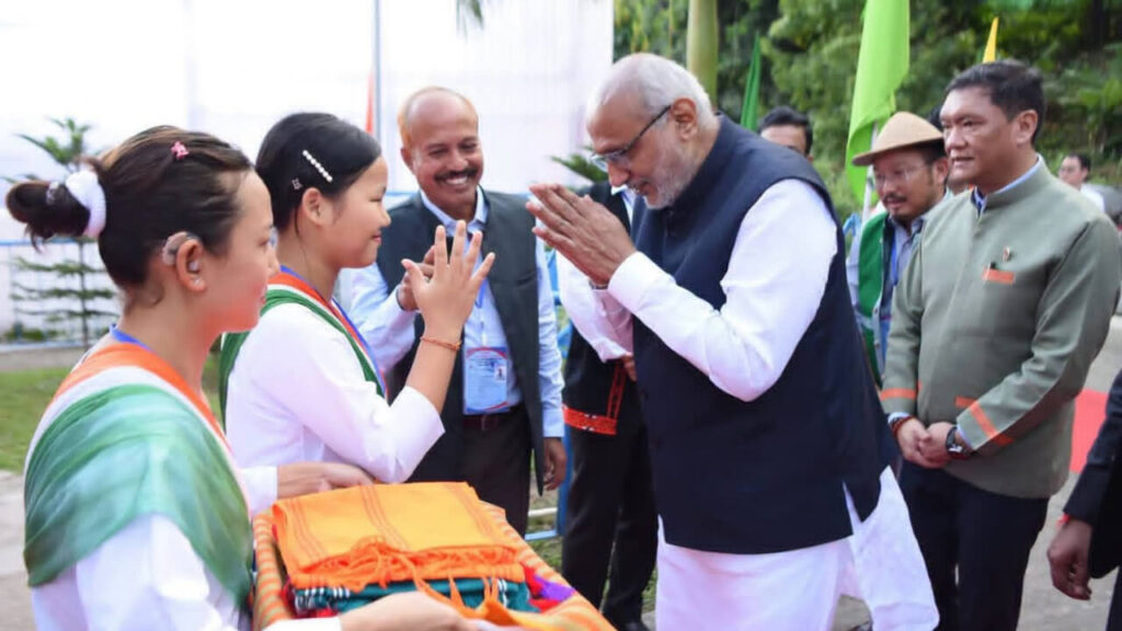 Students honoring the Vice President with gifts and shawl