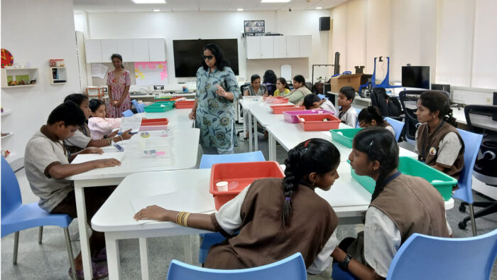 Students of KWAB School are engaged in a tactile art-based Anubhav session at ARC, IIT-B. Guided by VE facilitators, the children explore clay and other tactile materials to understand the human body through touch, texture, and creative expression.