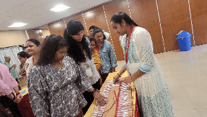 photograph from the CTiS 2026 at IISER Pune showcasing participants viewing the explanation of an activity