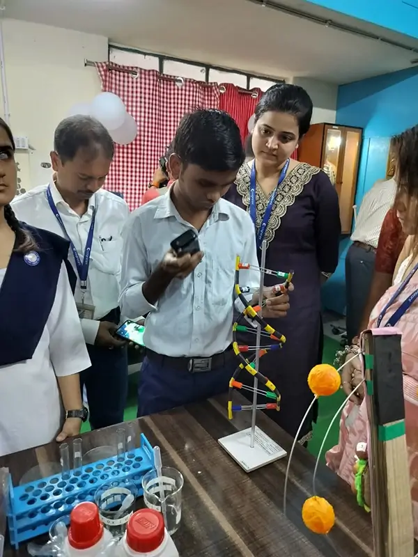 Children watching science exhibits